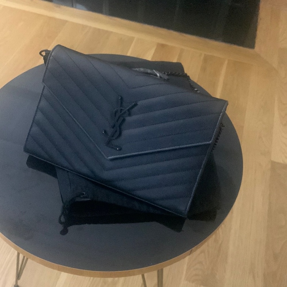 Ysl clutch with straps
